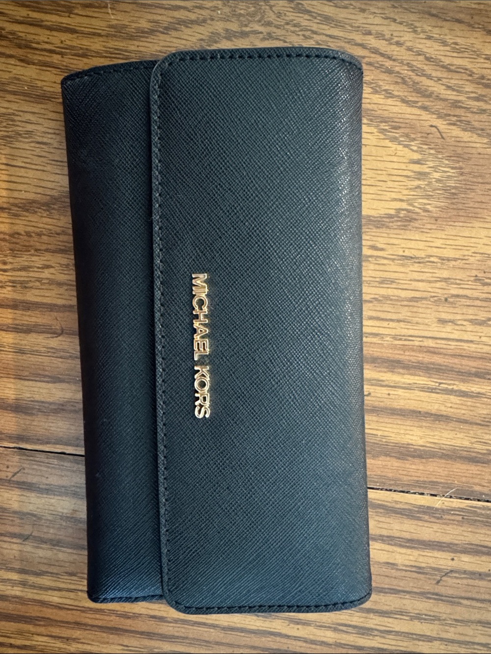 Michael Kors Black Saffiano Trifold Wallet with Gold Logo